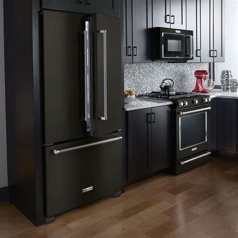 kitchens with black fridge